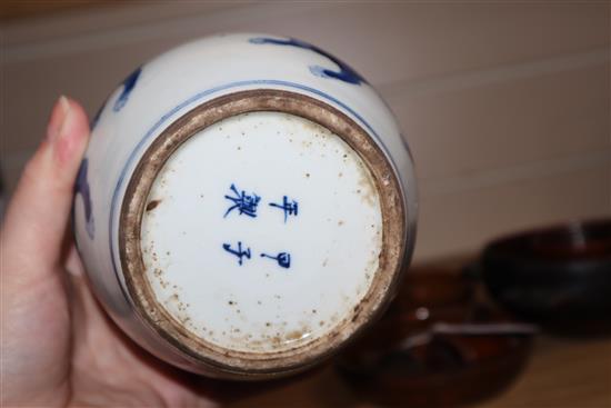 A pair of Chinese blue and white bottle vases tallest 22cm